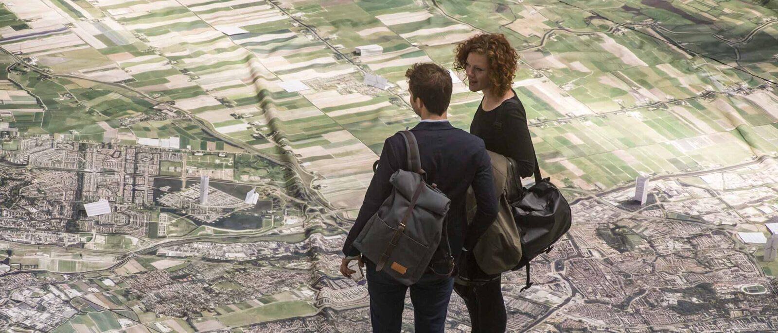 Bezoekers van het Duurzaam Erfgoed Congres overleggen waar zíj duurzame energie zouden opwekken